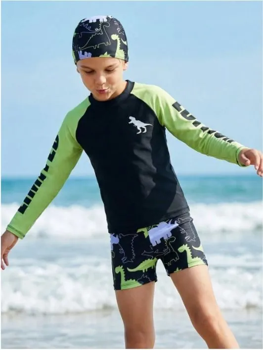 Traje de baño dos piezas para niños grandes, negro con celeste y estampado de figuras a los costados