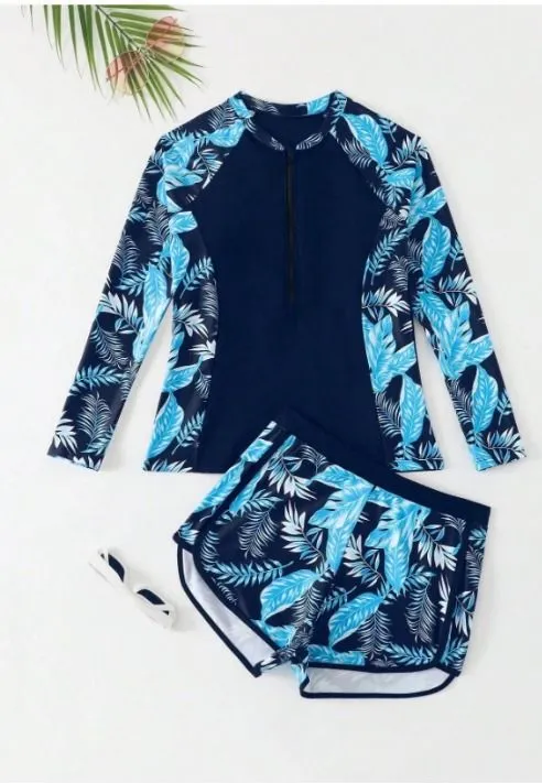 Traje de baño dos piezas, azul con decoracion de hojas celeste a los costados